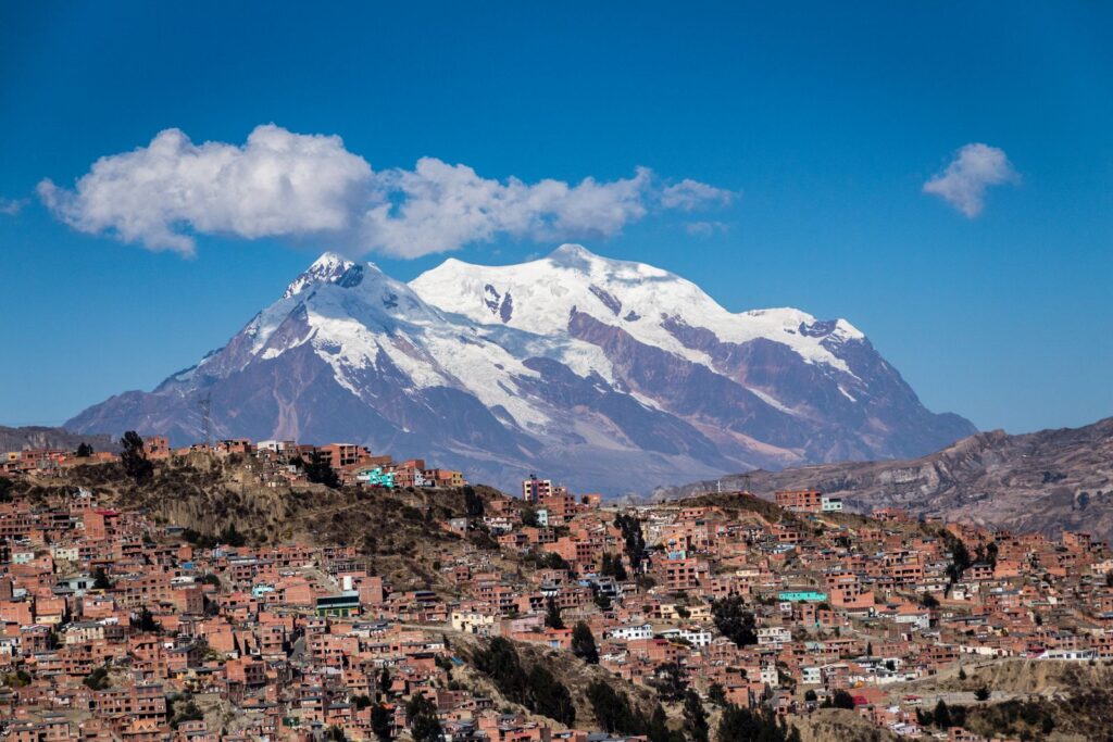 Snow capped Illimani mountain rising above the city of La Paz, Bolivia