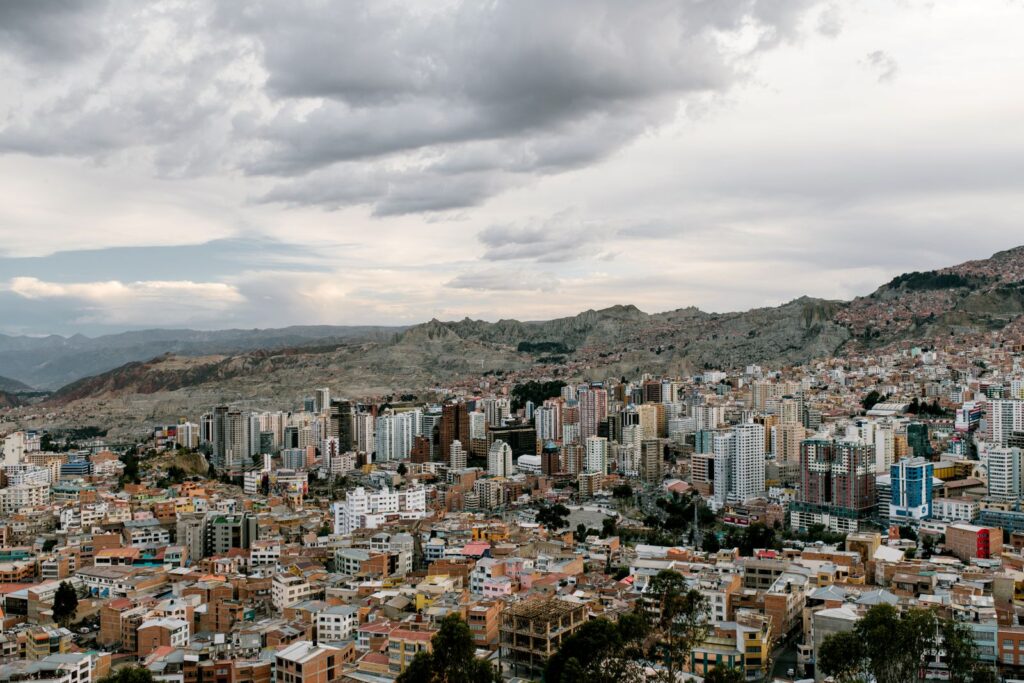 View over the dense hillside neighborhoods of La Paz under cloudy skies